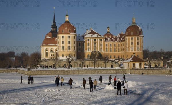 Winter, tobogganing on the frozen lake, sledging, tobogganing, winter sports