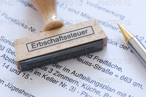 Stamp with the inscription inheritance tax, tax revenue, inheritance, will, assets, taxation
