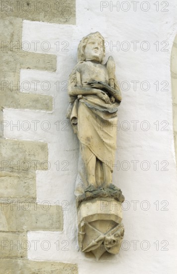 Christ figure on the north wall, exterior