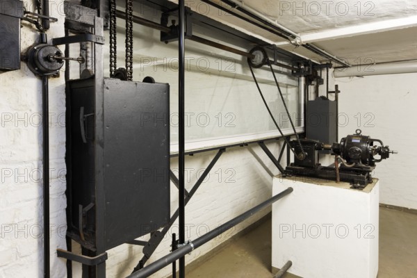 Cellar under the ladies' room, restored mechanism for lowering the large window to the garden,