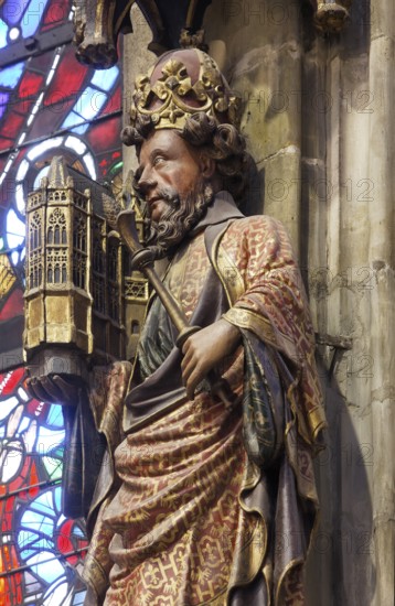 Choir hall, figure of Charlemagne on the eastern end wall with model of the cathedral