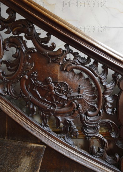 Residential house Zum goldenen Helm, cantilevered oak staircase, balustrade with cartouches.