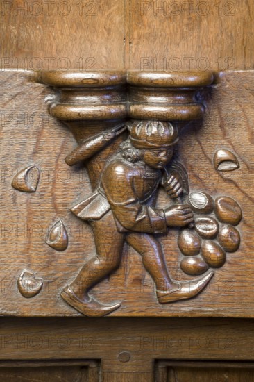 Choir stalls, drolleries on the stall sides with proverbial depictions, 1493 by Johannes Gruter