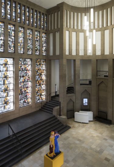 Central entrance hall with staircase and Jan Thorn-Prikkers leaded glass window mural