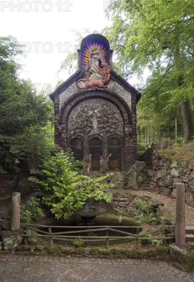 Garden of Redemption, chapel with the theme of redemption from evil, gable field with two trees of