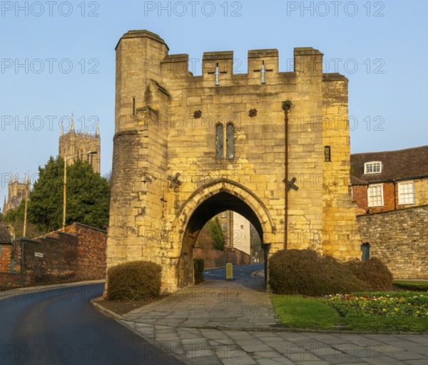 Pottergate medieval stone archway entrance to cathedral area in city of Lincoln, Lincolnshire,