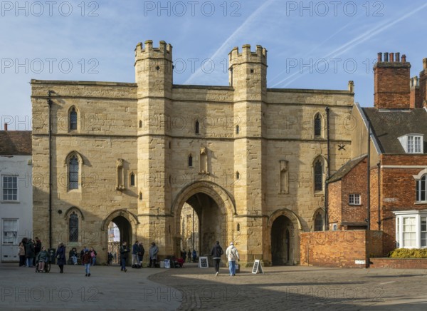 Sun shining on Exchequer Gate, Minster Yard, city of Lincoln, Lincolnshire, England, UK