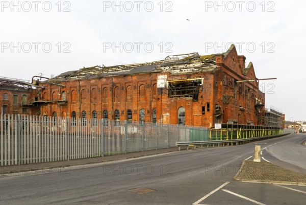 Derelict ruin of Great Grimsby Ice Factory built in 1900, Grimsby docks, north east Lincolnshire,