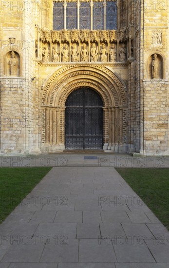 Carved stonework figures of kings, Gallery of Kings above doorway, frontage of cathedral church,