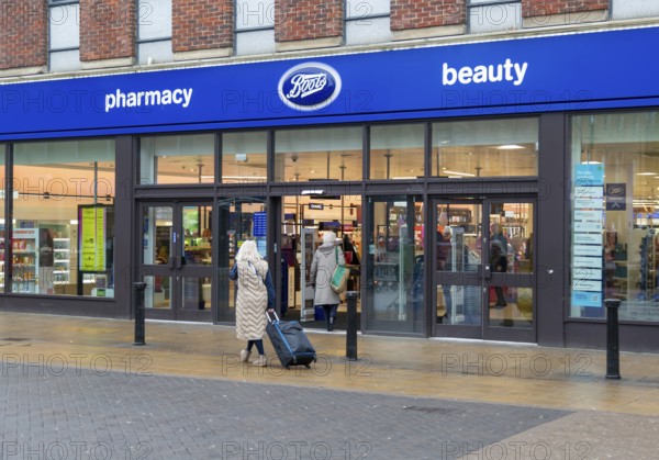 Boots pharmacy chemist shop, High Street, city of Lincoln, Lincolnshire, England, UK
