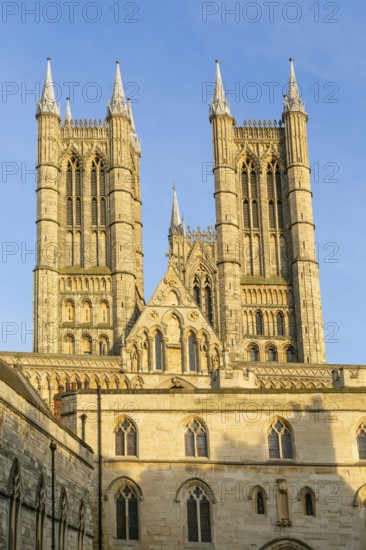 Towers of cathedral church rise above the medieval Exchequer Gate, Lincoln, Lincolnshire, England,