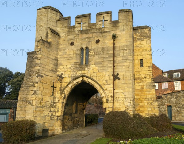 Pottergate medieval stone archway entrance to cathedral area in city of Lincoln, Lincolnshire,