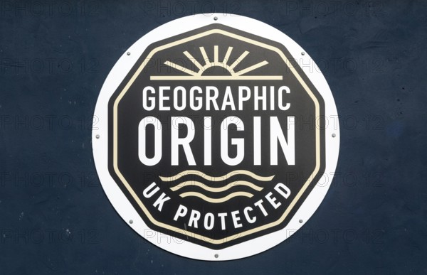 Geographic origin sign for Grimsby smoked fish, Grimsby docks, north east Lincolnshire, England, UK