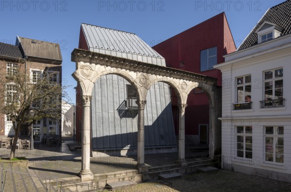 Aachen, courtyard with reconstructed Roman portico and modern buildings