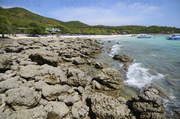 Rocks and sea water at Coral Island near Pattaya, Thailand, Asia