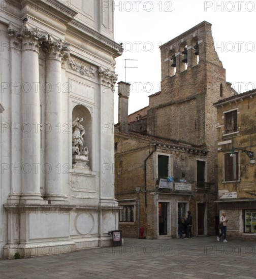 Italy Venice Campo San Rocco -186 Church of San Rocco 18th century façade detail right bell gable