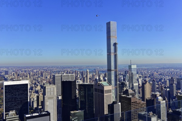 Rockefeller Center observation deck, skyscrapers stretch across the New York skyline under a clear