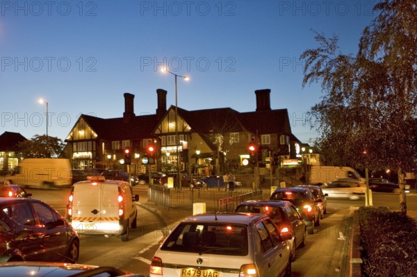 Traffic at Junction at twilight Harrow Middlesex, UK United Kingdom England