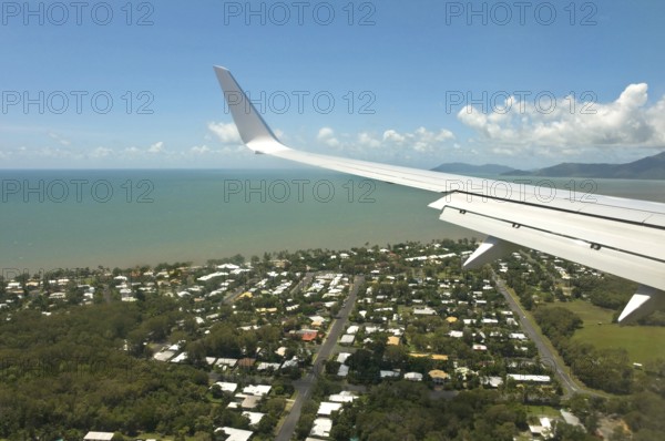 Aerial view of airplane approaching Cairns city, Queensland, Australia, Oceania