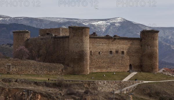 Castillo de Valdecorneja from the north behind the Sierra de Gredos