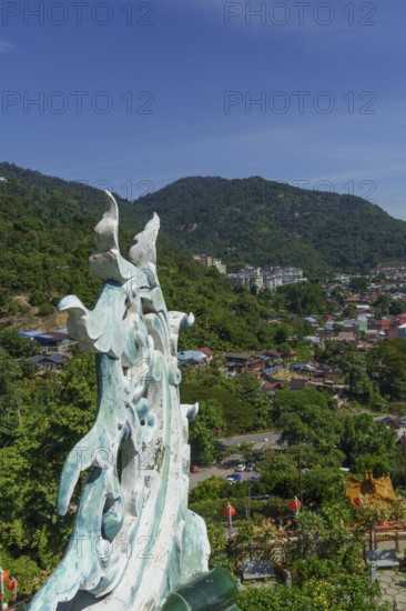 View of a traditional architecture with mountain landscape in the background, penang, malaysia