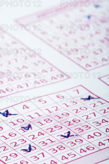 Marked lottery ticket close up. Studio shot