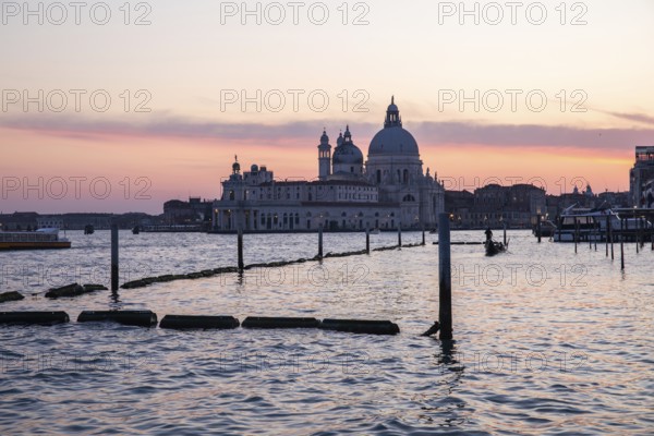 Evening mood, sunset, gondola and Santa Maria della Salute, Venice, Veneto, Italy, Europe