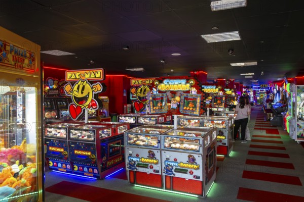 Amusement arcade games machines Inside Claremont Pier, Lowestoft, Suffolk, England, UK