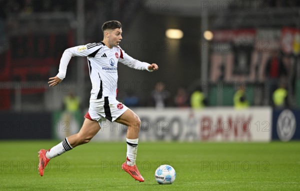 Stefanos Tzimas 1. FC Nürnberg FCN (09) Action on the ball DFB Cup, PreZero Arena, Sinsheim,