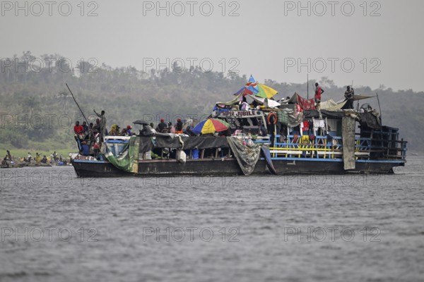 Overloaded ferry on the Congo River, near Tshumbiri, Mai-Ndombe Province, Democratic Republic of