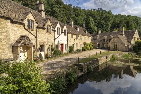 The village of Castle Combe on the River Bybrook, Cotswolds, Wiltshire, England, Great Britain