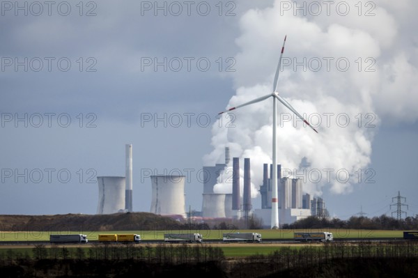 Grevenbroich, North Rhine-Westphalia, Germany - Lorry on A44 motorway and wind farm in front of RWE