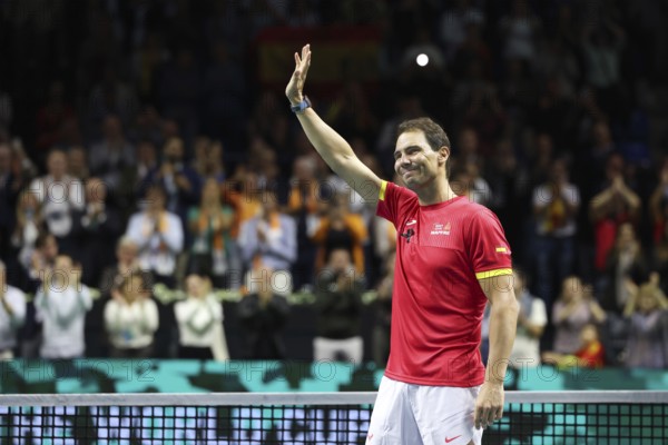 Rafael Nadal (ESP) waving during a tribute ceremony as he retires from playing professional tennis