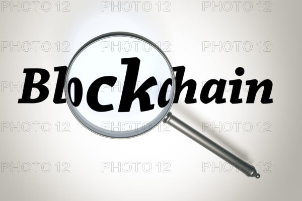 3D illustration of a magnifying glass and the word Blockchain
