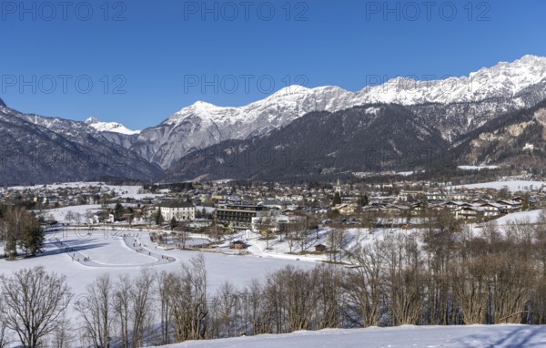 Winter panorama, Saalfelden am Steinernen Meer, Salzburg, ice skating on Lake Ritzensee