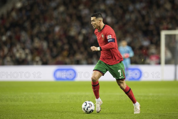 Football match, captain Cristiano RONALDO CR7 Portugal on the ball running towards the left looking