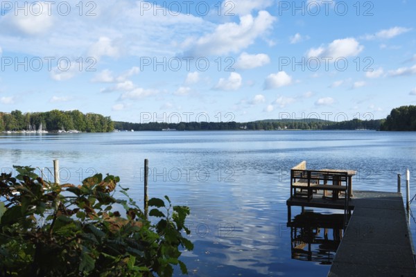 View over the Scharmützelsee with a jetty in the foreground, Bad Saarow, Brandenburg, Germany,
