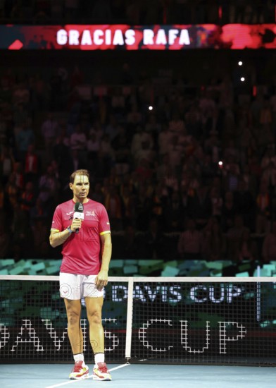 Rafael Nadal (ESP) speaks during a tribute ceremony as he retires from playing professional tennis