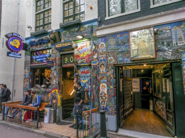 A heavily decorated, painted coffeeshop in the red light district of the historic city centre,