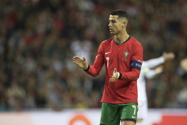 Football match, captain Cristiano RONALDO CR7 Portugal with captain's armband clapping his hands