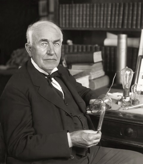 Thomas Alva Edison with his lightbulb, digitally edited