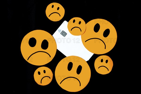 Illustration of discontent, scam, disappointment with bank credit cards represented with sad orange