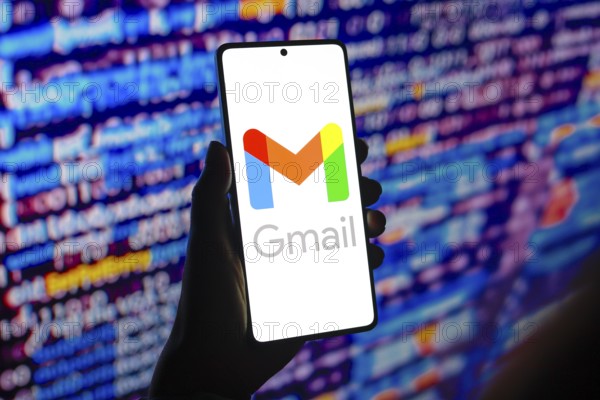 In this photo illustration, the Google Gmail logo is displayed on a smartphone screen