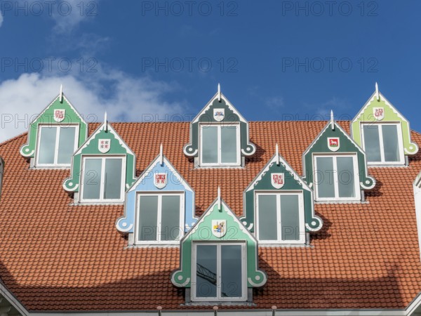 Roof with 7 triangular pointed dormer windows of the town hall (Stadhuis Zaanstad), Zaandam, North