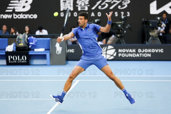 MELBOURNE, AUSTRALIA, JANUARY 11: Novak Djokovic of Serbia plays Stefanos Tsitsipas of Greece