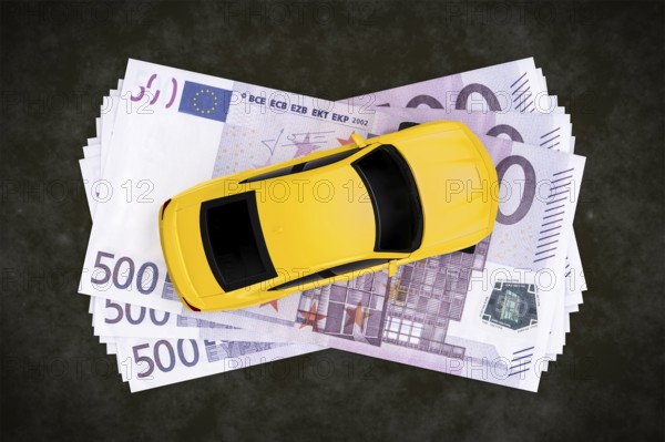 A cash for car symbol image with 500 Euro banknotes