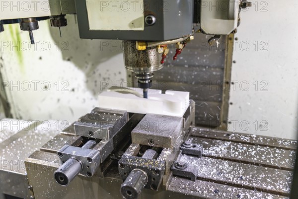 Close-up of a mechanical machine to mold plastic parts with no people