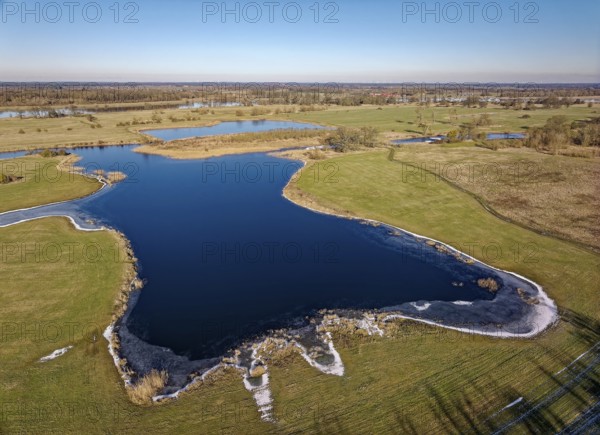 Icy waters on a winter's day in the floodplains of the Elbe valley near Schönberg on the dyke.