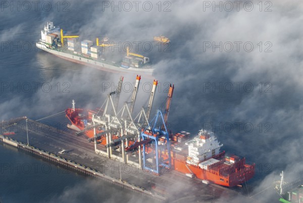 Aerial view of a container ship of the shipping company Hamburg Süd the Monte Olivia at the