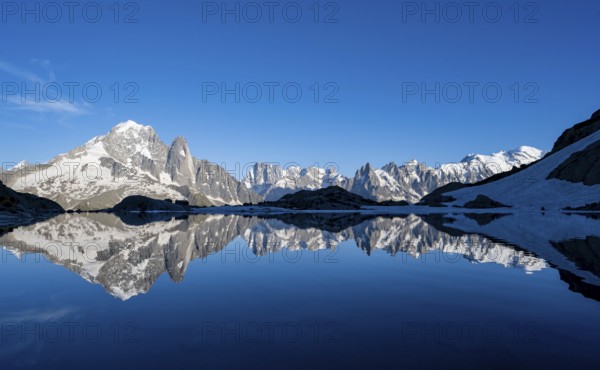 Mountain landscape in the evening light, water reflection in Lac Blanc, mountain peak, Aiguille